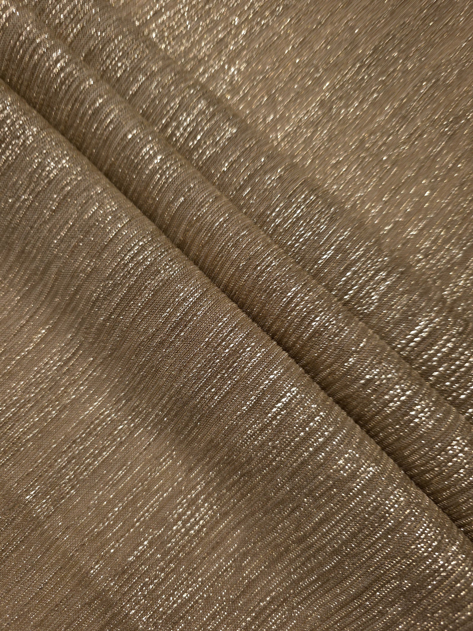 Layered Antique Taupe Gold Sheer Metallic Shimmer Stretch Tulle Fabric showing shimmering depth, soft transparency and airy flexible folds for eveningwear, overlays, costumes and stagewear