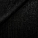 Charcoal Black Sheer Metallic Shimmer Stretch Tulle Fabric shown front and back, revealing reflective metallic shimmer, translucent mesh structure and flexible stretch for layered garments, costumes and dancewear