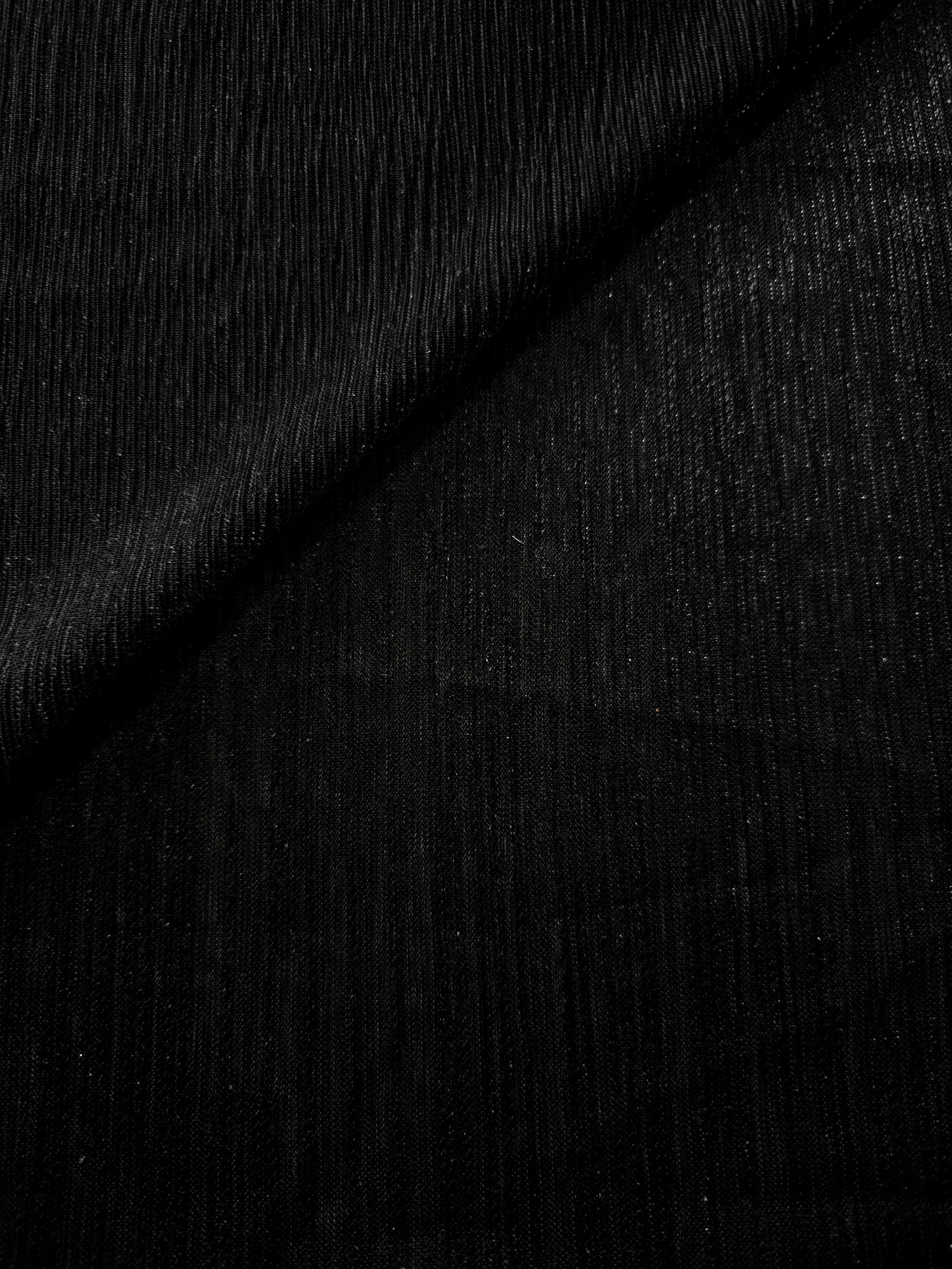 Charcoal Black Sheer Metallic Shimmer Stretch Tulle Fabric shown front and back, revealing reflective metallic shimmer, translucent mesh structure and flexible stretch for layered garments, costumes and dancewear
