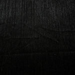Surface view of Charcoal Black Sheer Metallic Shimmer Stretch Tulle Fabric showing even metallic shimmer, fine sheer tulle texture, translucent finish and stretch for overlays, dresses and performance wear