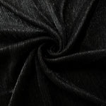 Swirl-draped Charcoal Black Sheer Metallic Shimmer Stretch Tulle Fabric showing fluid movement, reflective shimmer, airy transparency and flexible stretch for dresses, dancewear and stage looks