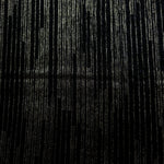 Surface view of Jet Black Sheer Metallic Shimmer Stretch Tulle Fabric showing even metallic shimmer, fine sheer tulle texture, translucent finish and stretch for overlays, dresses and performance wear