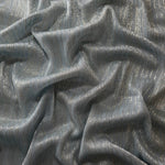 Draped Pewter Gray Sheer Metallic Shimmer Stretch Tulle Fabric showing luminous reflective folds, soft transparency and flexible flow for dresses, dancewear, stagewear and occasion looks