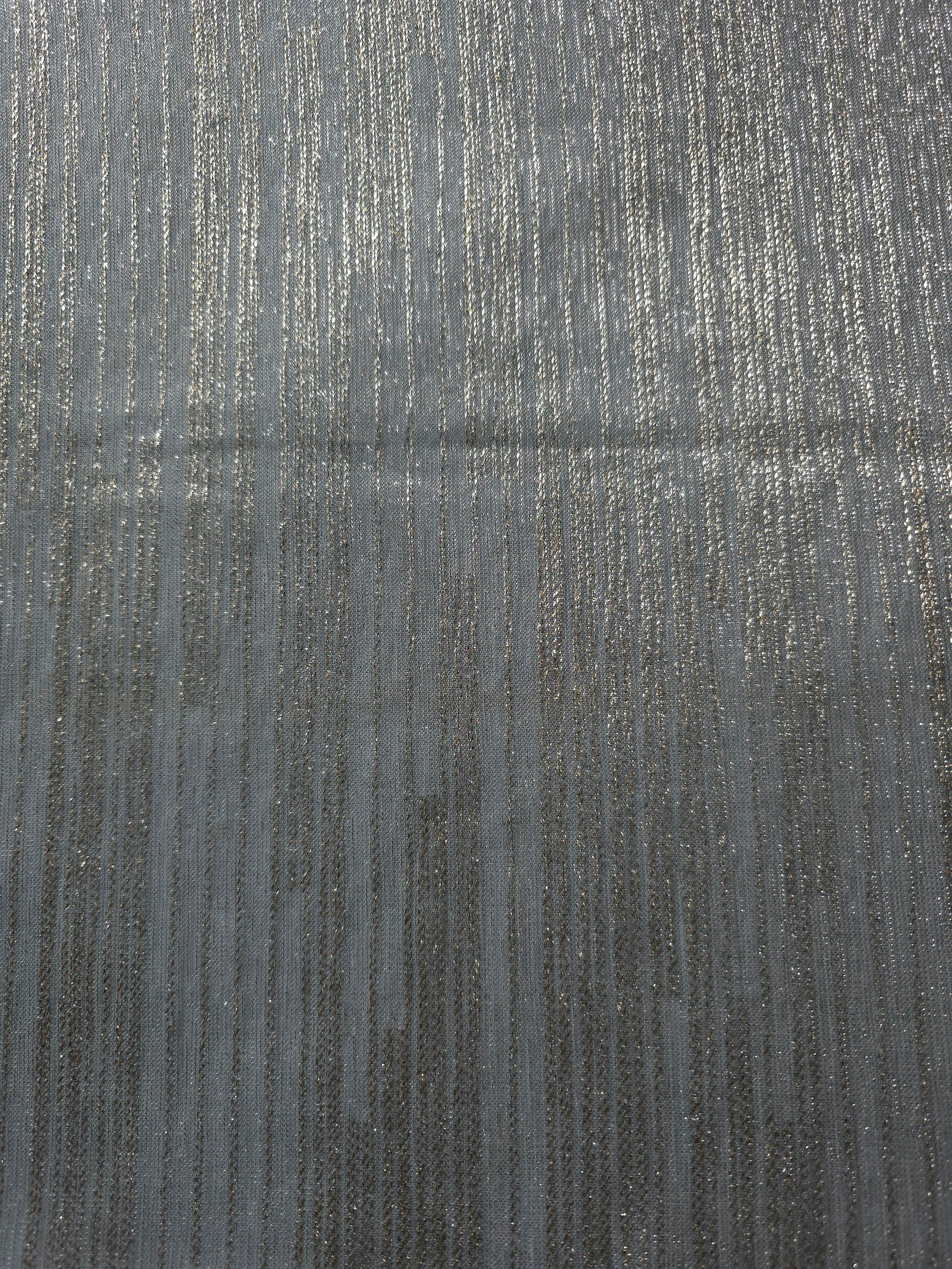 Surface view of Pewter Gray Sheer Metallic Shimmer Stretch Tulle Fabric showing even metallic shimmer, fine sheer tulle texture, translucent finish and stretch for overlays, dresses and performance wear