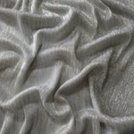 Draped Silver Gray Sheer Metallic Shimmer Stretch Tulle Fabric showing luminous reflective folds, soft transparency and flexible flow for dresses, dancewear, stagewear and occasion looks