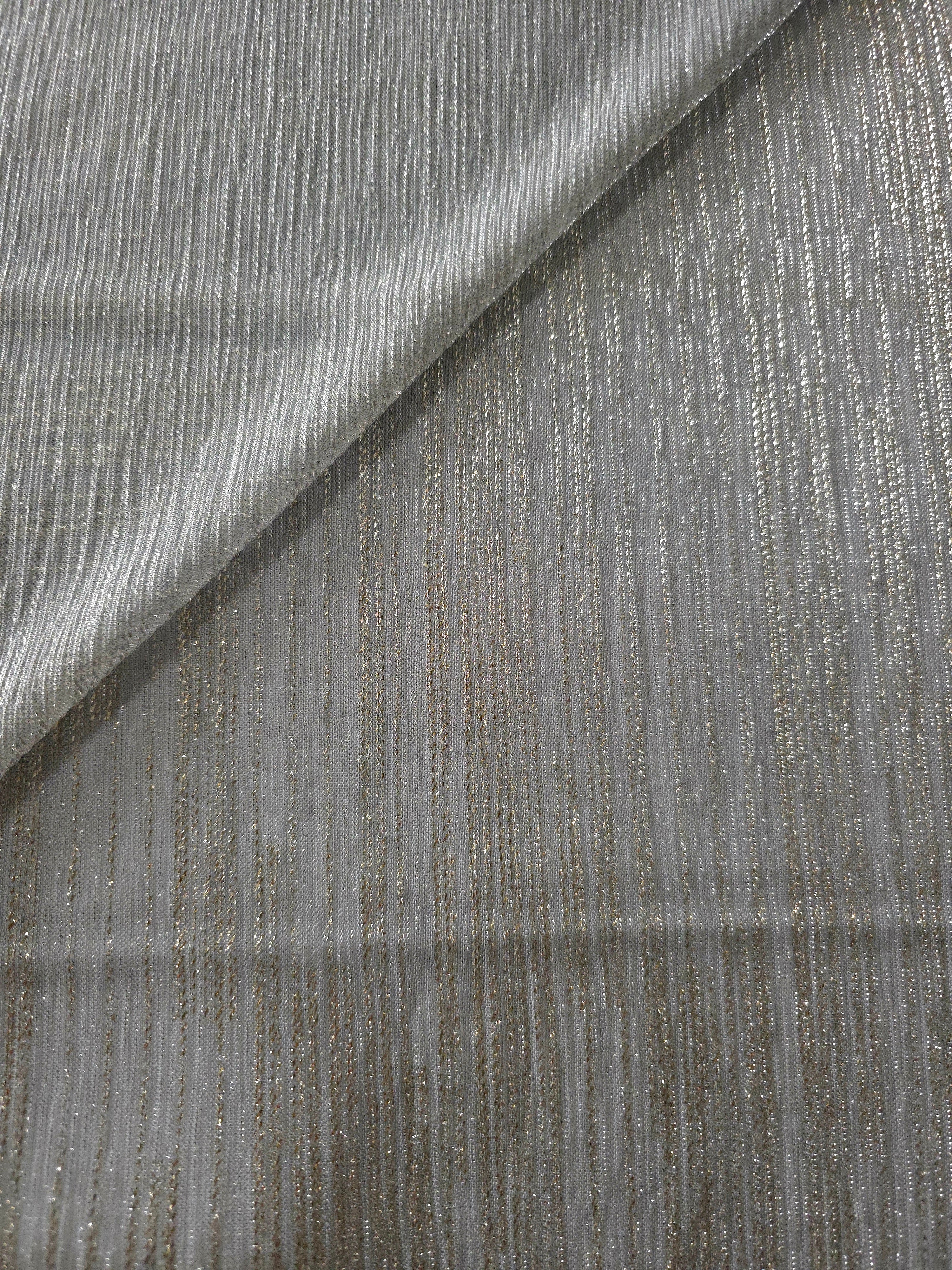 Silver Gray Sheer Metallic Shimmer Stretch Tulle Fabric shown front and back, revealing reflective metallic shimmer, translucent mesh structure and flexible stretch for layered garments, costumes and dancewear
