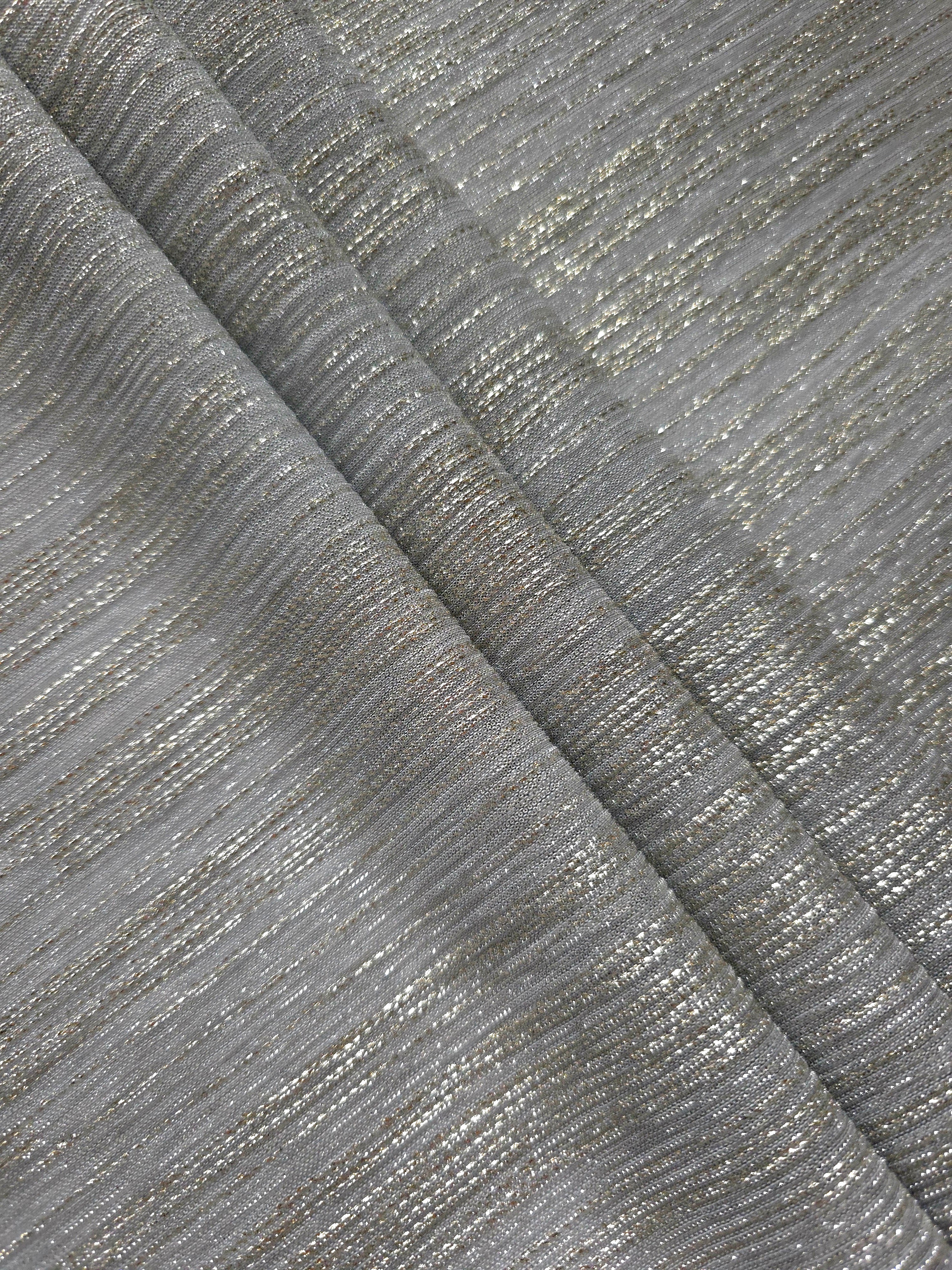 Layered Silver Gray Sheer Metallic Shimmer Stretch Tulle Fabric showing shimmering depth, soft transparency and airy flexible folds for eveningwear, overlays, costumes and stagewear