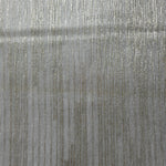 Surface view of Silver Gray Sheer Metallic Shimmer Stretch Tulle Fabric showing even metallic shimmer, fine sheer tulle texture, translucent finish and stretch for overlays, dresses and performance wear