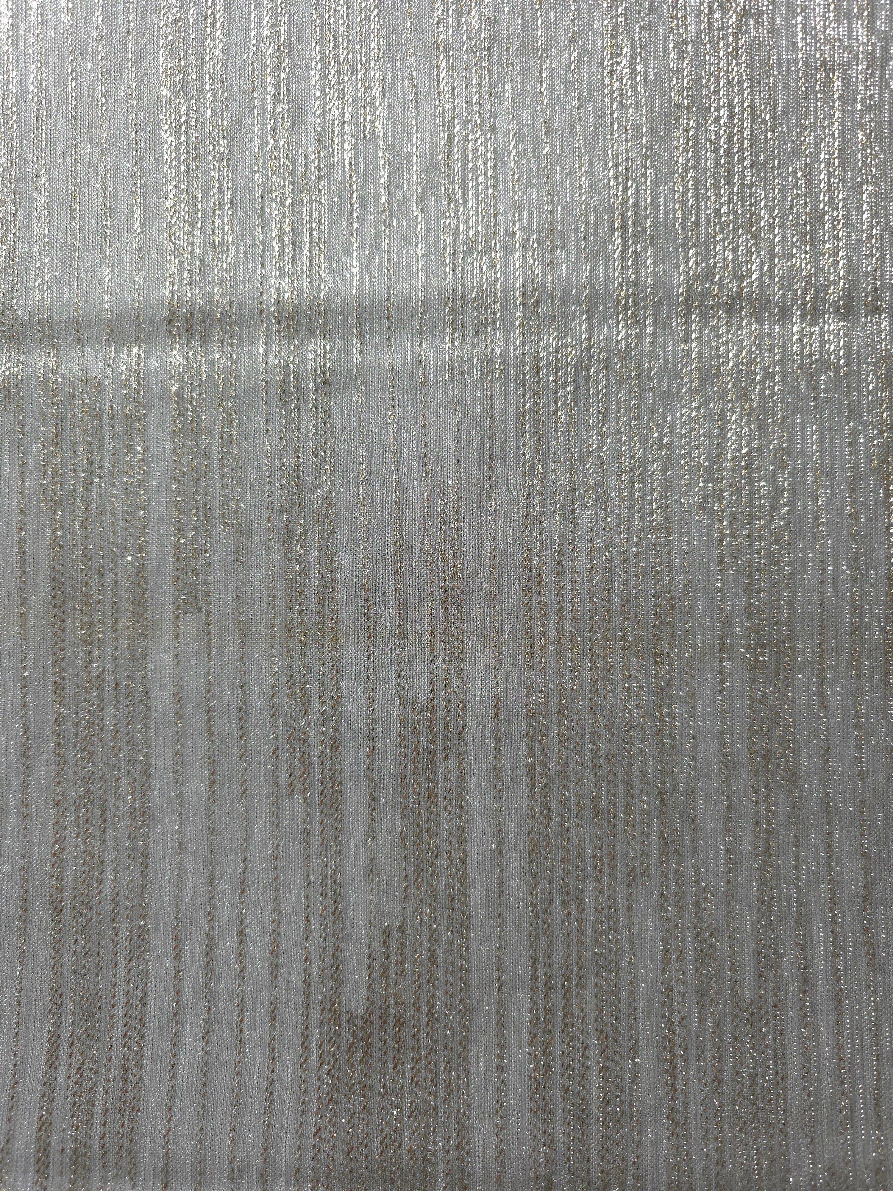 Surface view of Silver Gray Sheer Metallic Shimmer Stretch Tulle Fabric showing even metallic shimmer, fine sheer tulle texture, translucent finish and stretch for overlays, dresses and performance wear