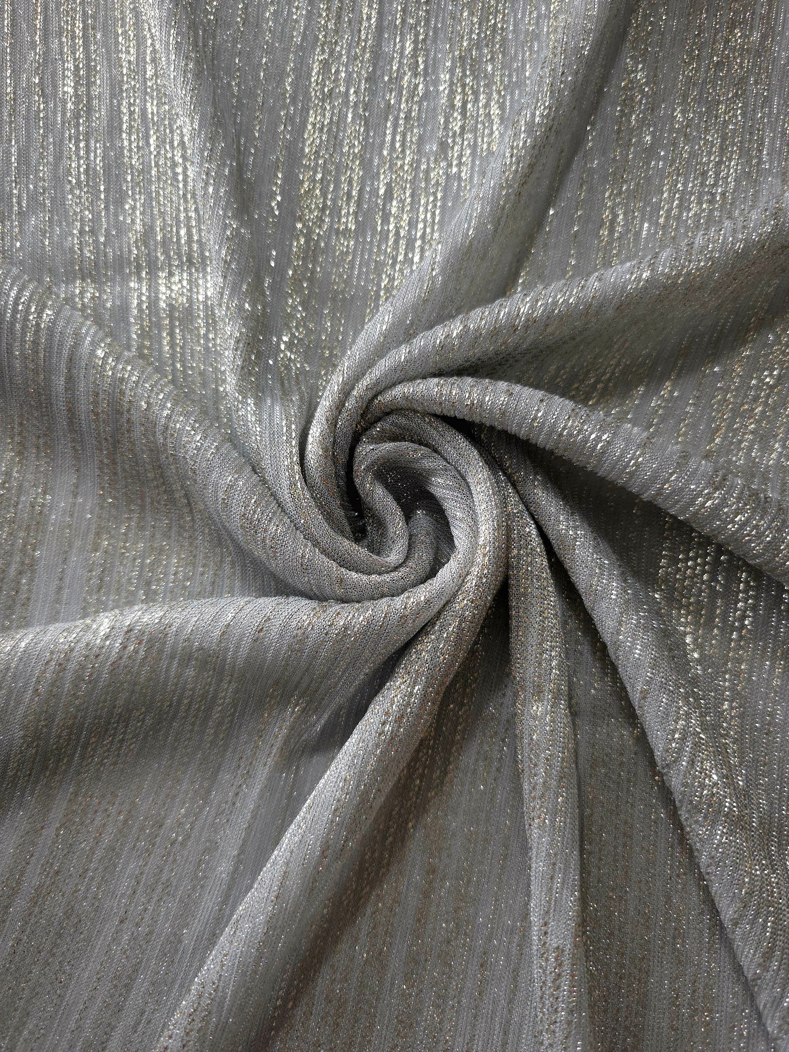 Swirl-draped Silver Gray Sheer Metallic Shimmer Stretch Tulle Fabric showing fluid movement, reflective shimmer, airy transparency and flexible stretch for dresses, dancewear and stage looks