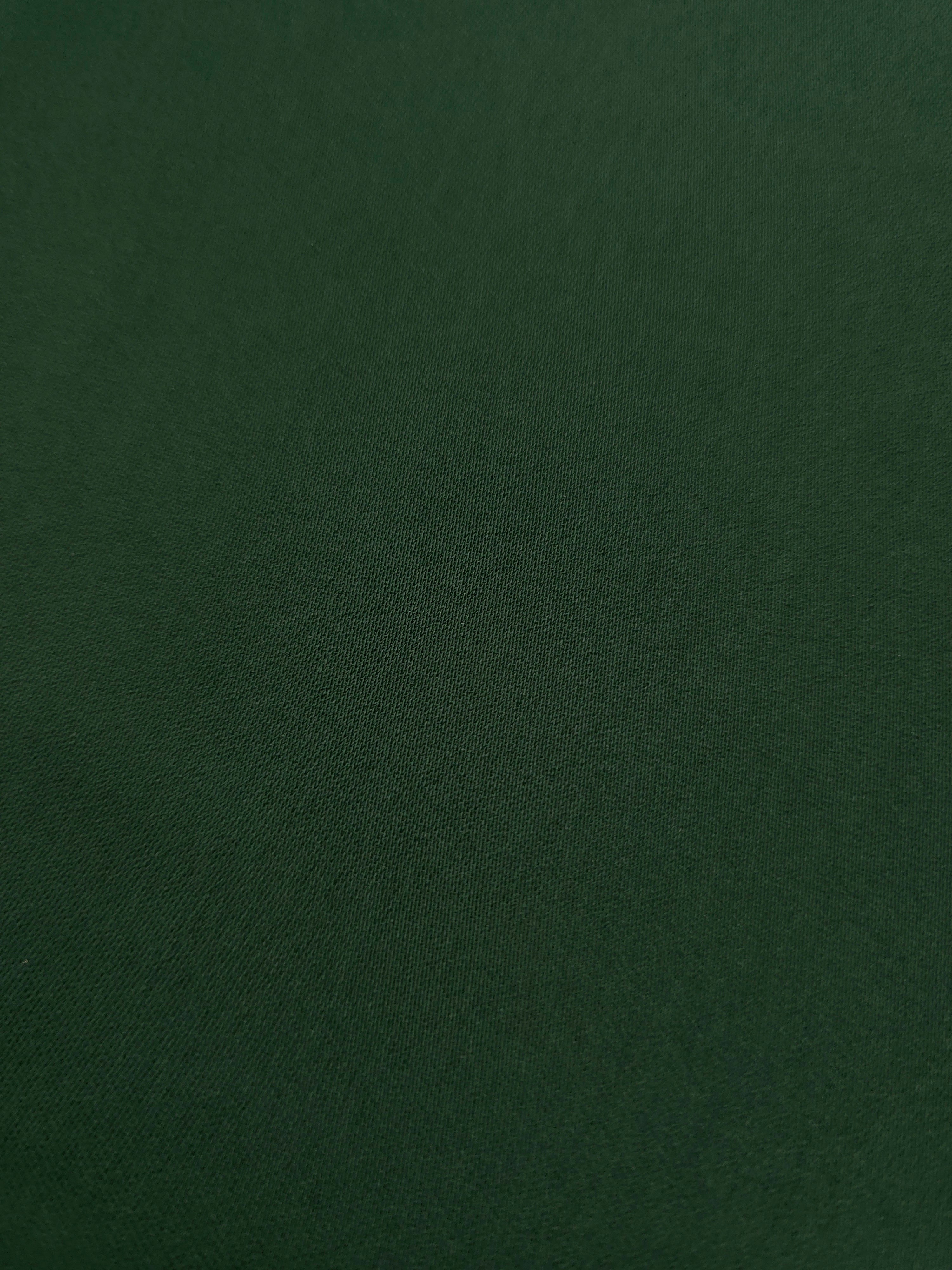 Texture detail of Dark Hunter Green mechanical polyester crepe, showing a fine weave and silky-soft surface