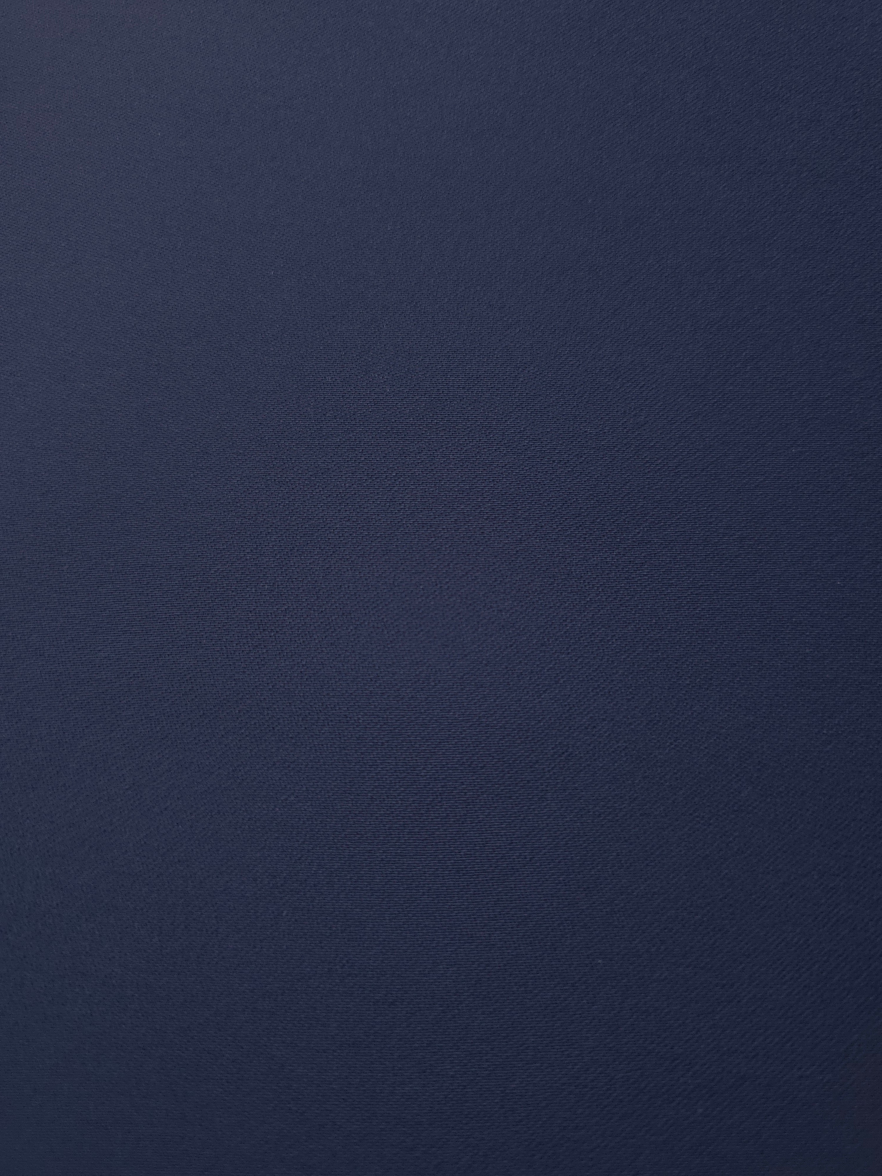 Dark Navy Blue crepe texture close-up showing fine mechanical polyester weave and a smooth silky-soft hand