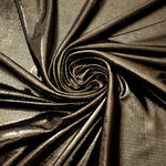 Dark Olive Taupe foiled spandex styled in a swirl, revealing metallic shine and flexible drape for dance costumes and occasion looks