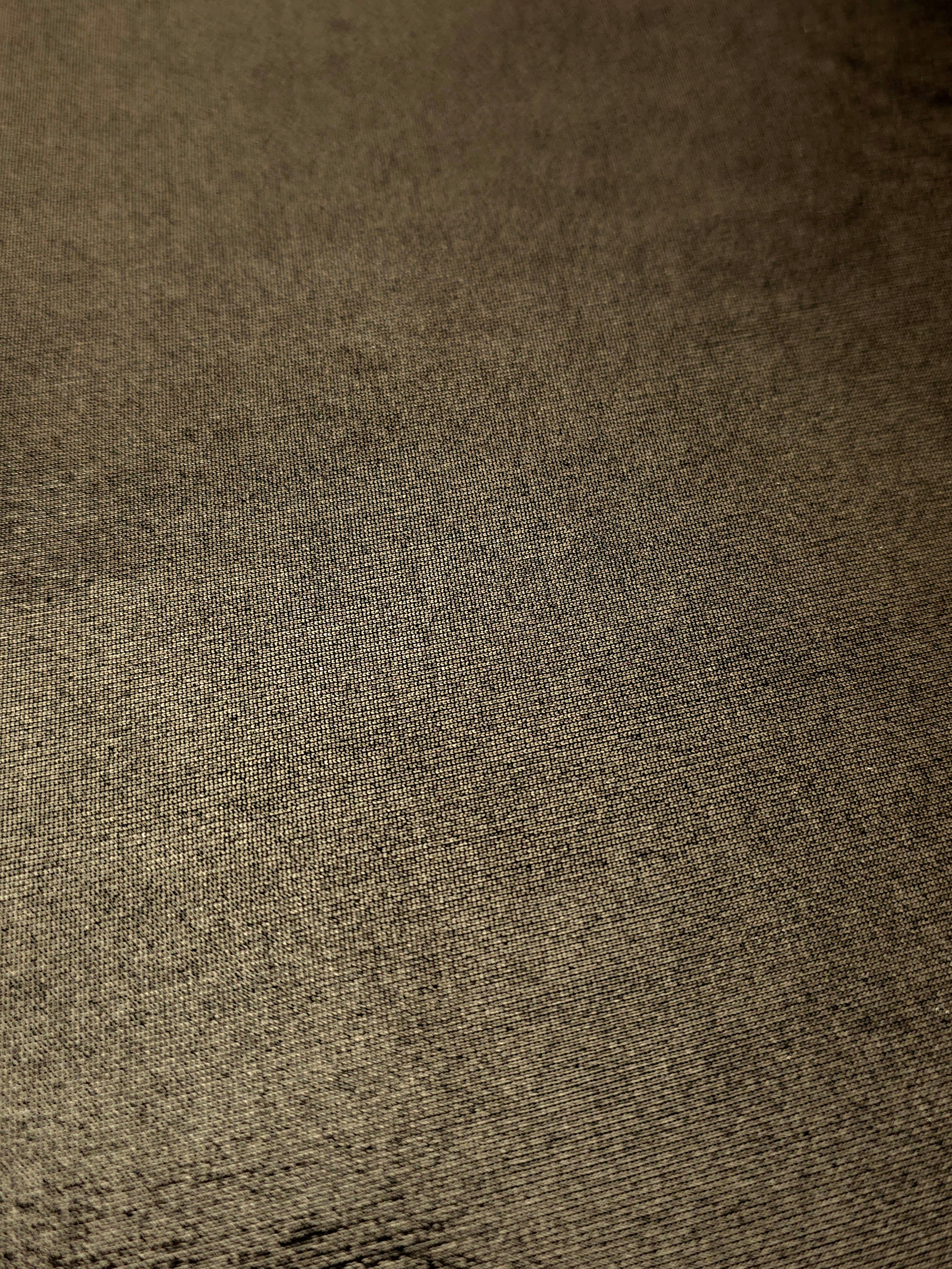 Close-up Dark Olive Taupe shimmer metallic spandex showing reflective foil detail and the fabric surface for statement garments