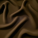 Dark Walnut Brown polyester crepe in long draped folds, showing flowing coverage for abayas and modest fashion