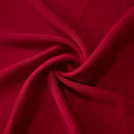 Swirled Deep Cherry Red Korean crepe showing fluid movement and silky drape for dresses and occasionwear