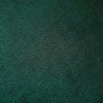 Deep Emerald Green shimmer stretch fabric close-up, revealing metallic foil texture and reflective detail for fashion and costume sewing