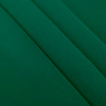 Layered Deep Jade Green Korean polyester crepe showing gentle mechanical stretch and soft structure for dressmaking