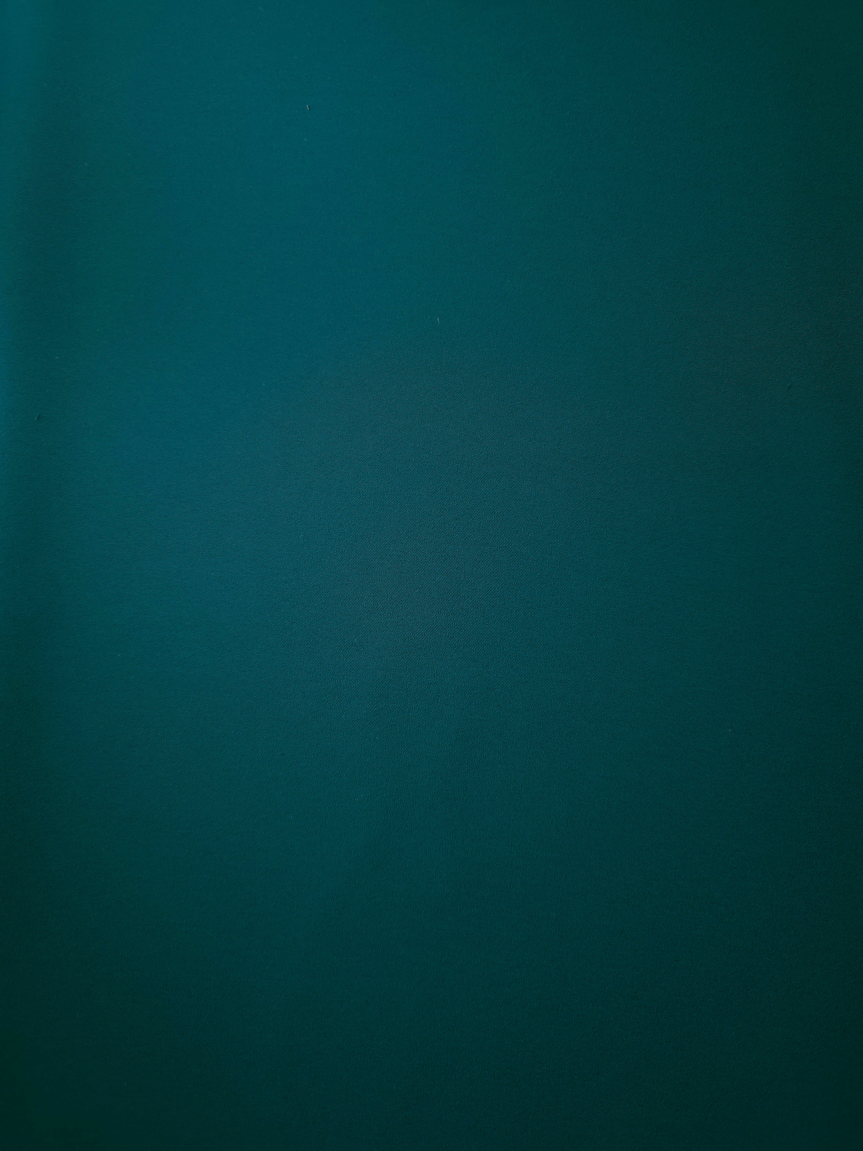 Deep Teal opaque Korean polyester crepe shown flat, 205 GSM smooth woven fabric for dressmaking