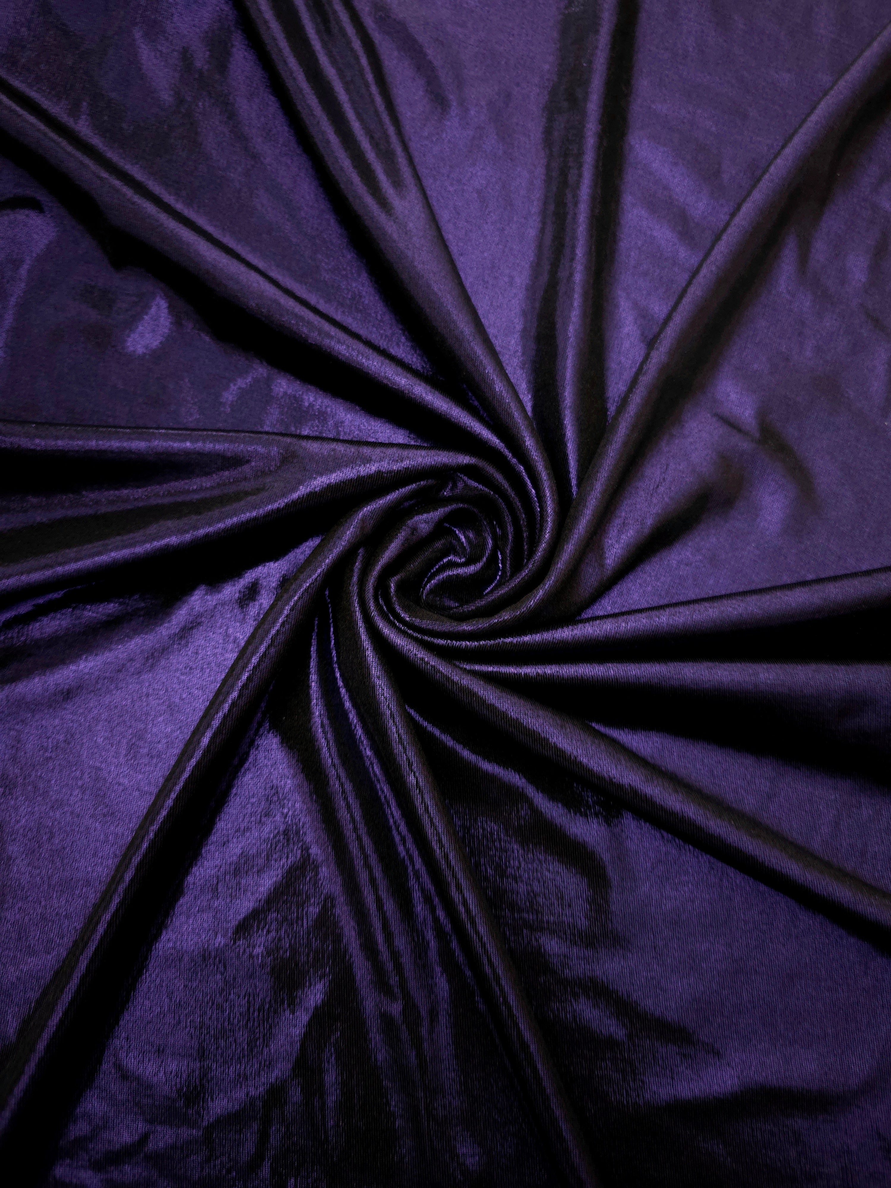 Spiraled Deep Violet Purple shimmer spandex fabric showing reflective movement for evening dresses, costumes and performance apparel