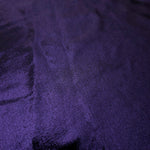 Texture view of Deep Violet Purple metallic stretch fabric, highlighting foil shimmer and surface detail for performance apparel
