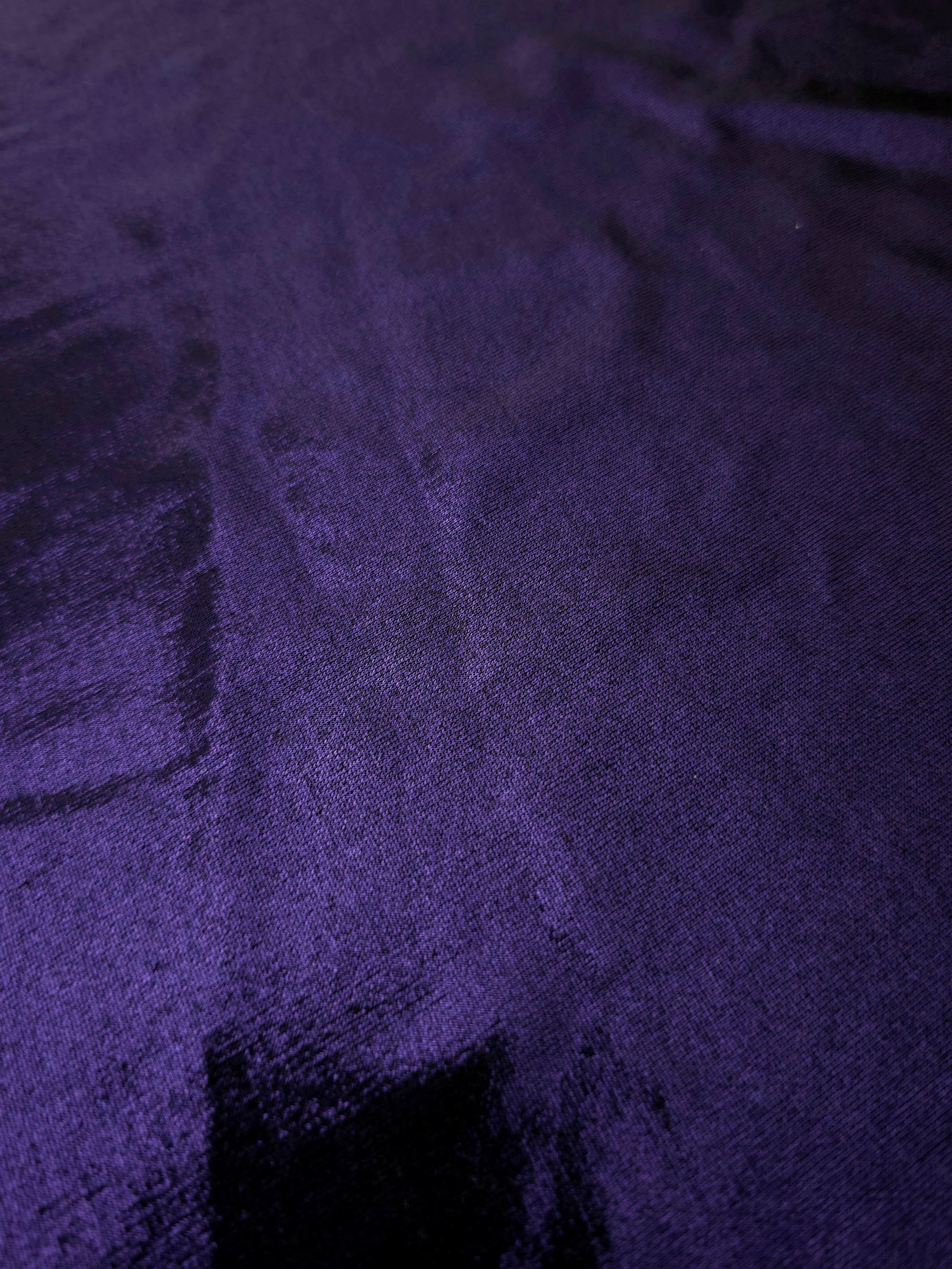 Texture view of Deep Violet Purple metallic stretch fabric, highlighting foil shimmer and surface detail for performance apparel