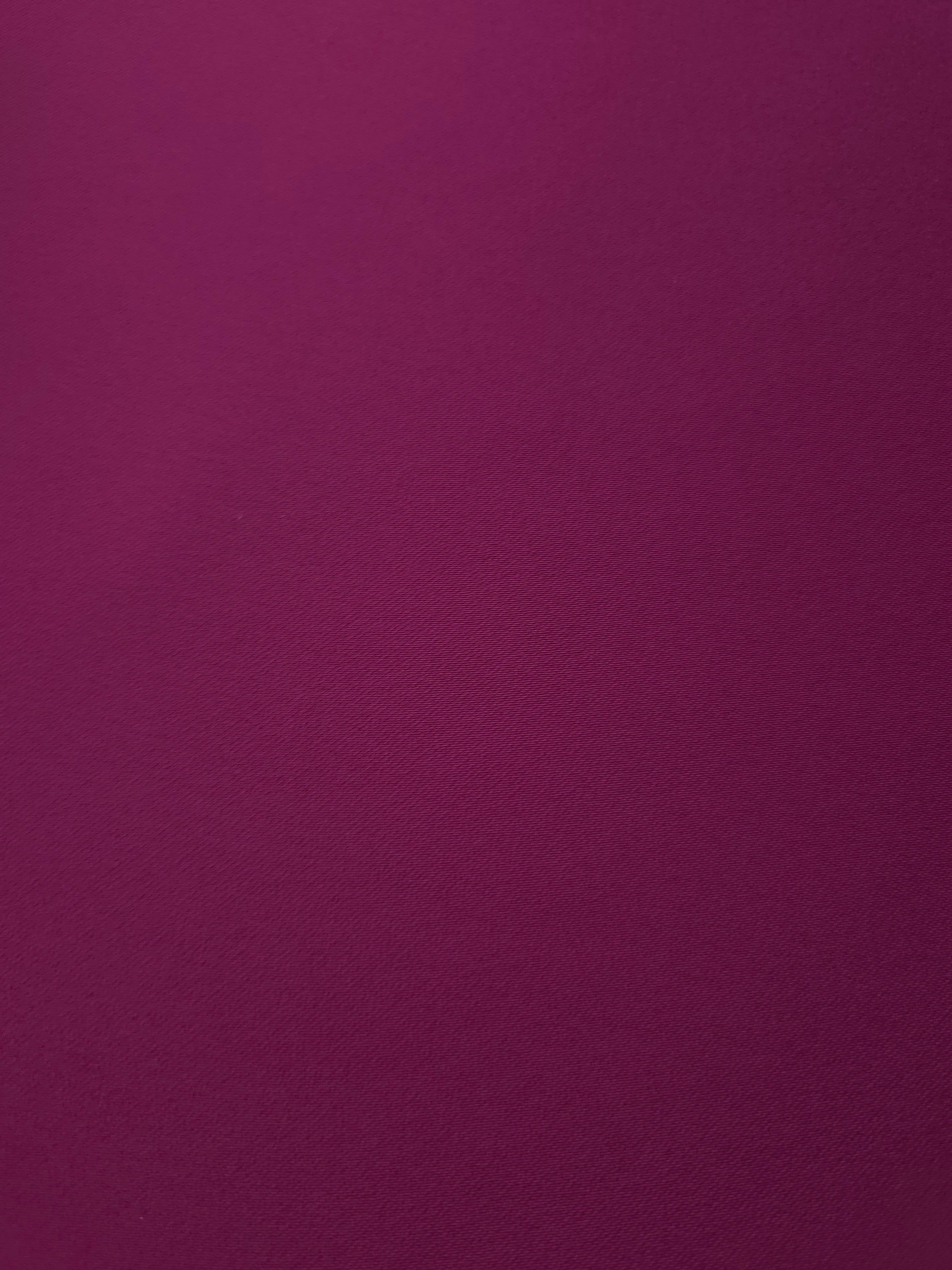 Deep Wine Berry mechanical polyester crepe in close-up, showing fine woven texture and a silky-feel surface