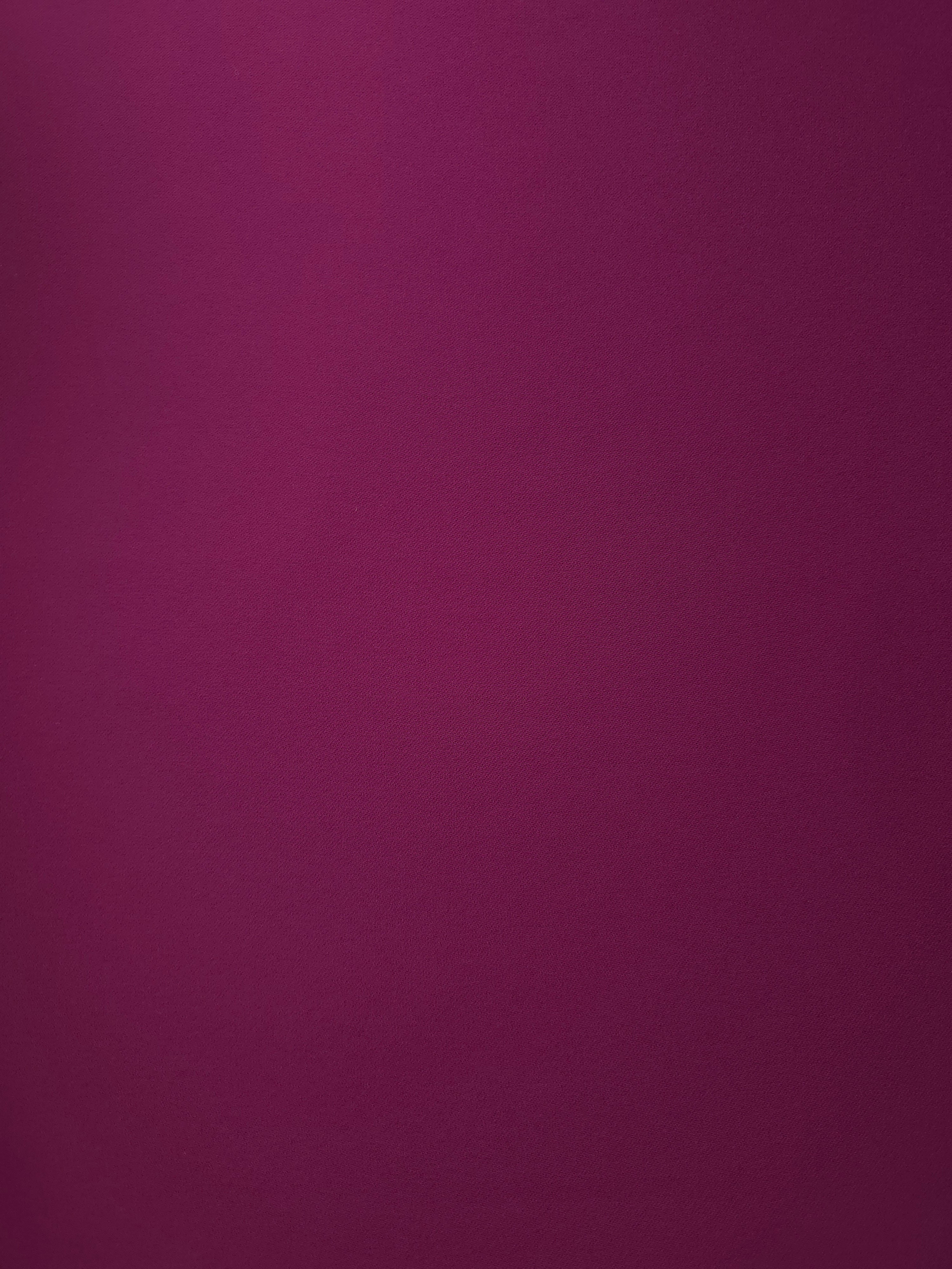 Deep Wine Berry Italian polyester crepe shown flat, smooth woven dressmaking fabric with a silky-soft finish