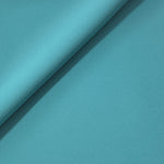 Soft-fold view of Dusty Aqua Blue Korean polyester crepe showing fluid drape for blouses, skirts and dresses