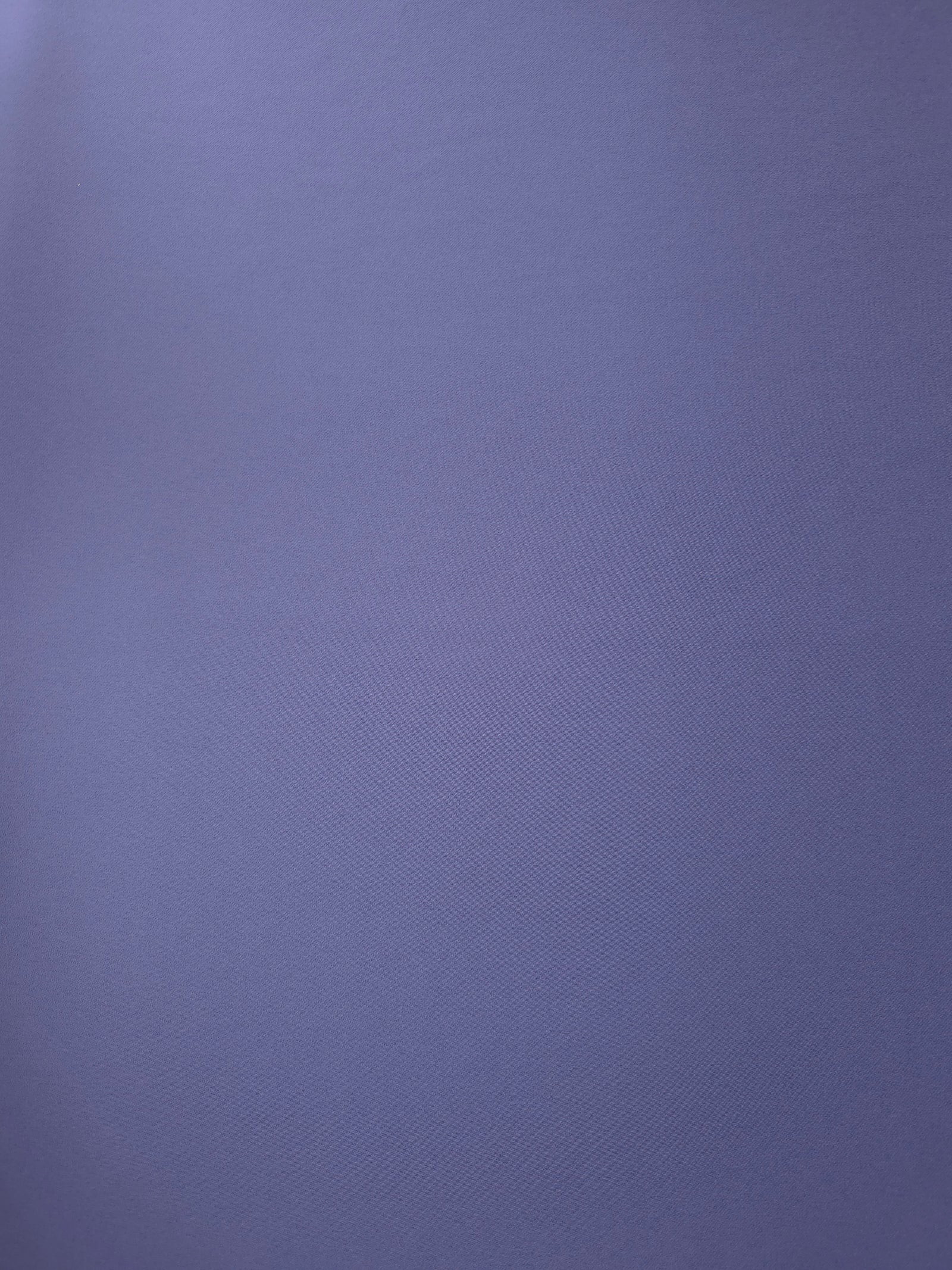 Dusty Indigo Blue Korean crepe fabric shown flat, 205 GSM opaque polyester with a smooth surface and silky-soft hand