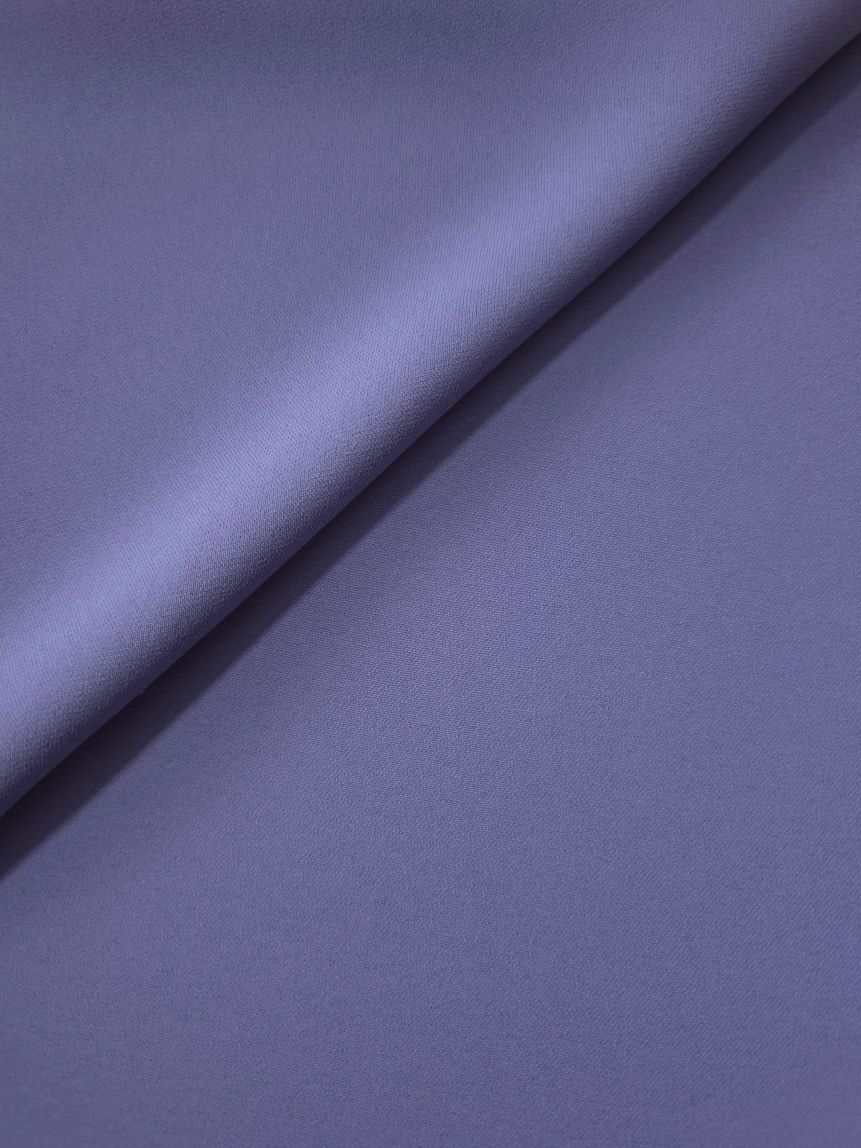 Dusty Indigo Blue silky-soft Korean crepe folded loosely to show fluid drape for blouses and occasionwear separates