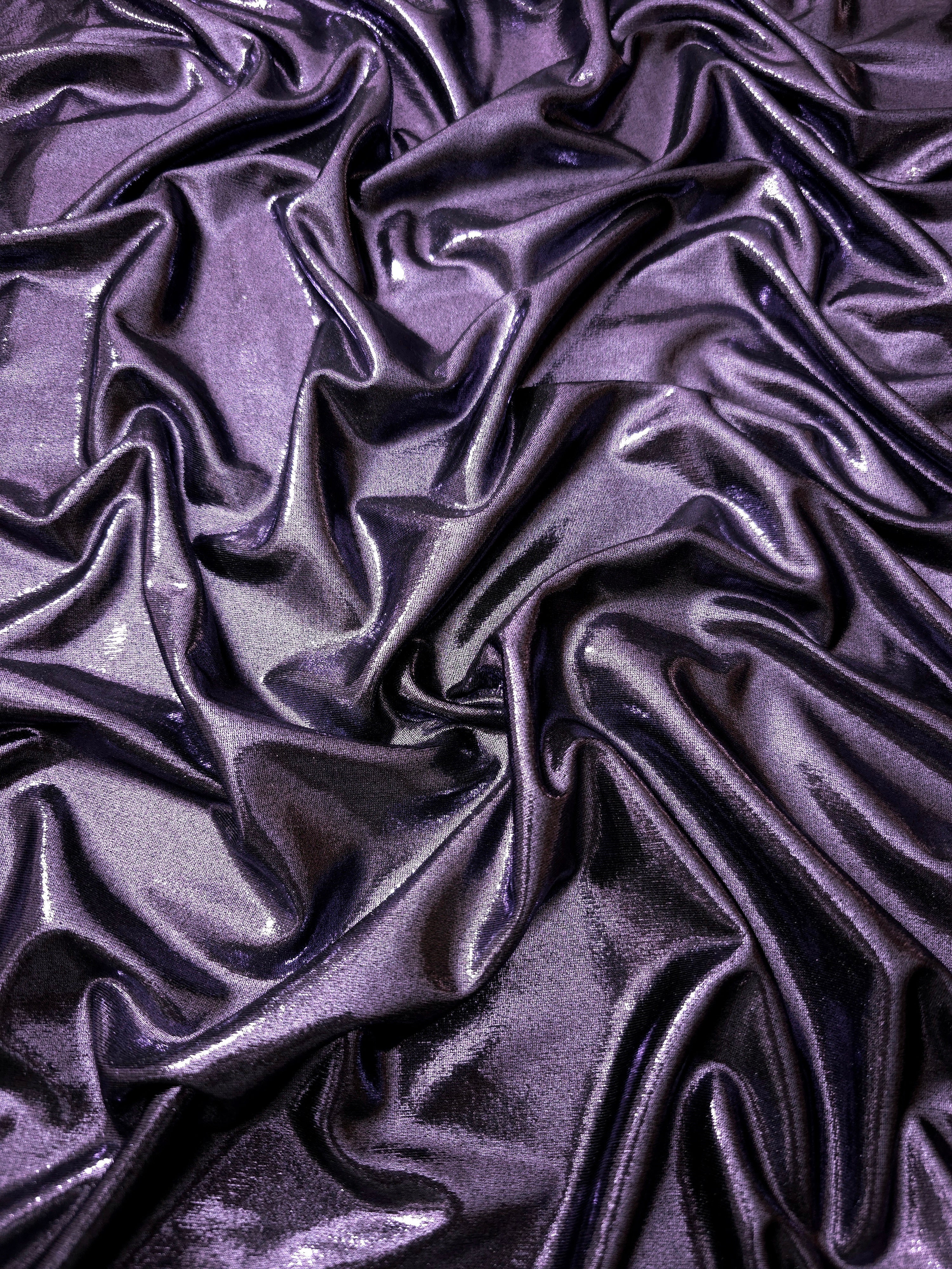 Softly draped Dusty Lavender Purple foiled spandex fabric showing fluid shape and metallic shimmer for dresses, stage costumes and eventwear