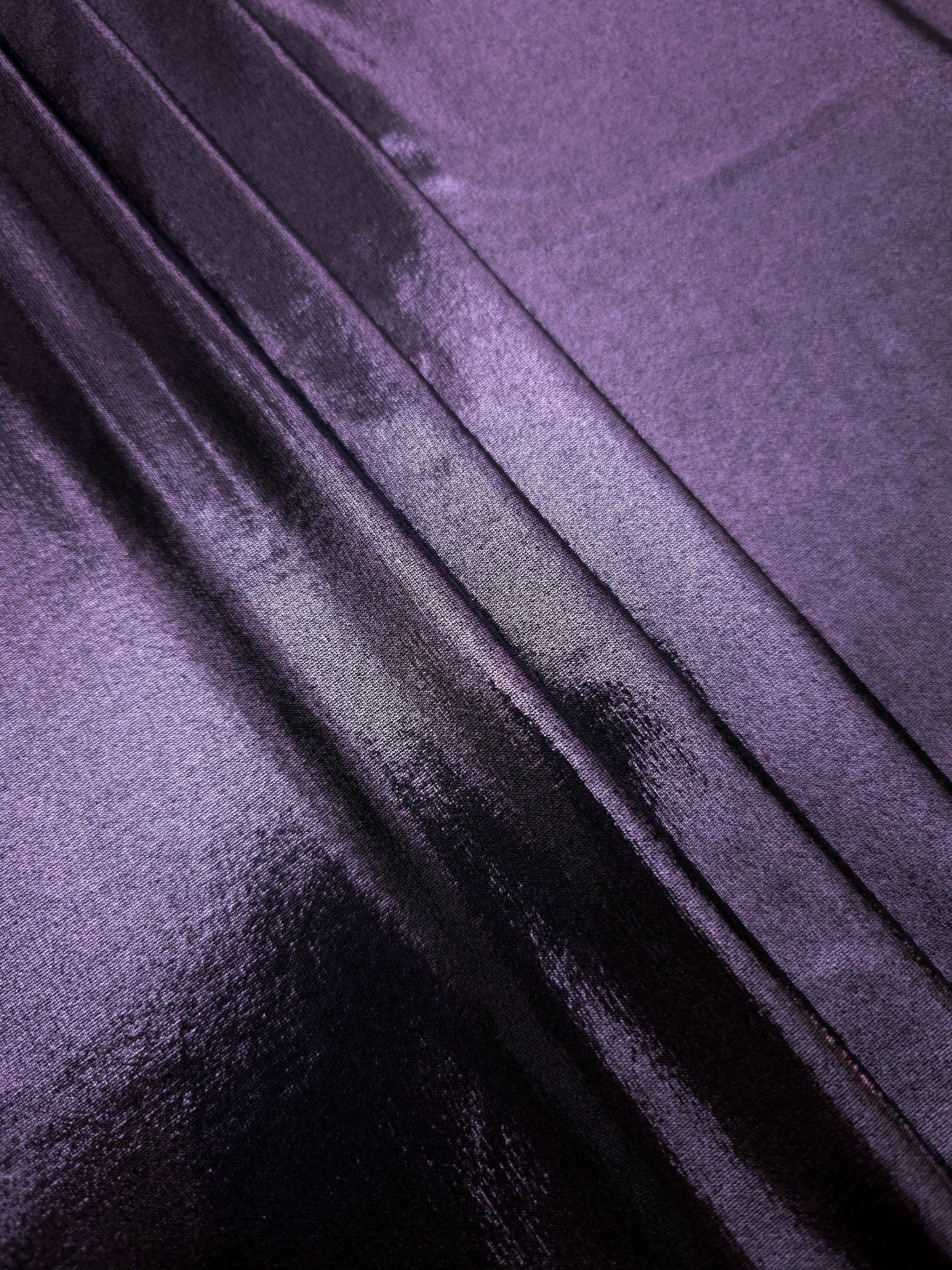 Dusty Lavender Purple foiled spandex arranged in layered folds, displaying shimmer and soft structure for skirts, tops and performancewear