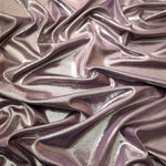 Draped Dusty Mauve Gray metallic foiled spandex showing reflective folds and flexible flow for dresses, stagewear and occasion looks
