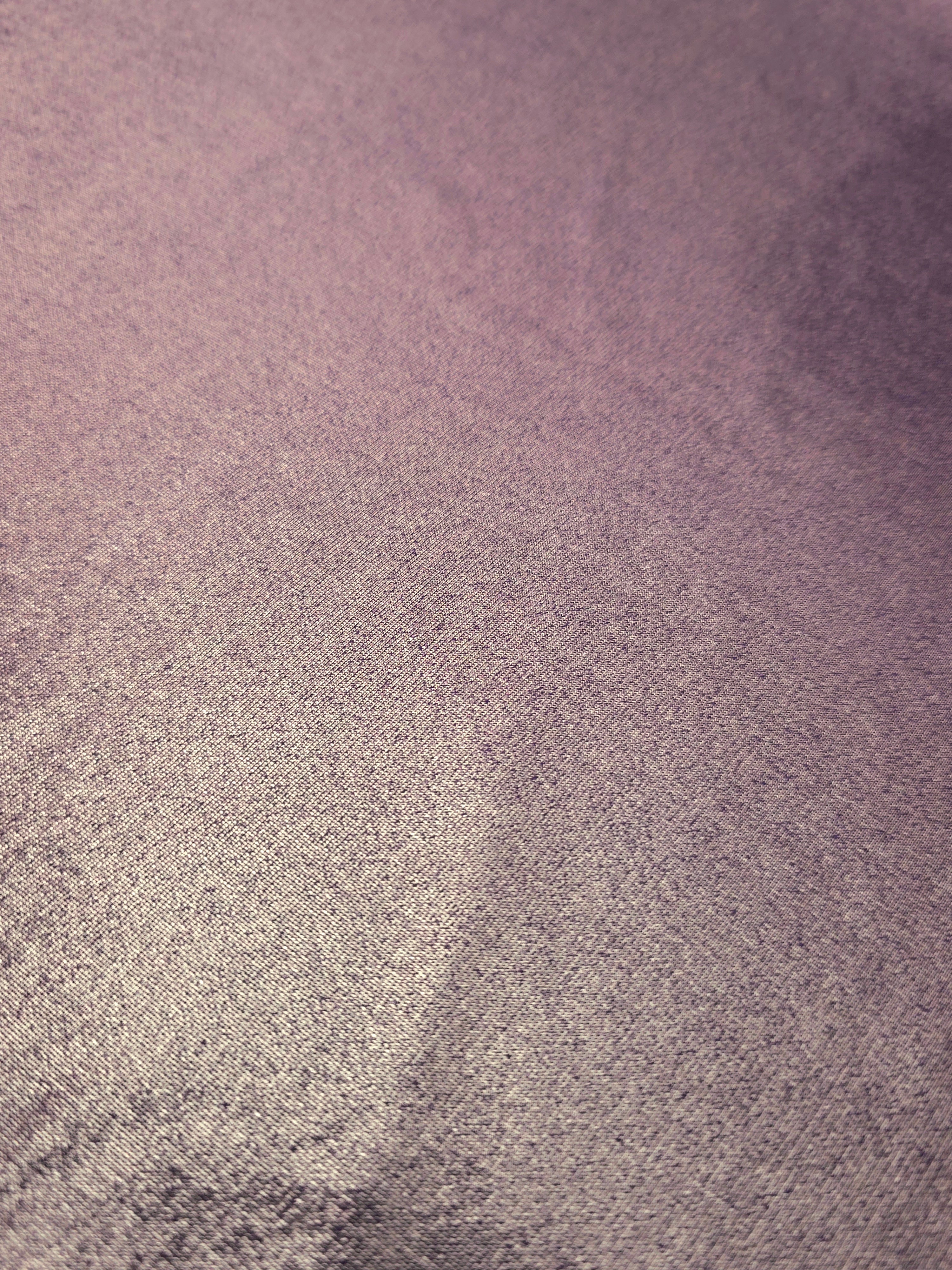 Detailed close-up of Dusty Mauve Gray foiled spandex fabric showing its luminous metallic surface and fine reflective texture