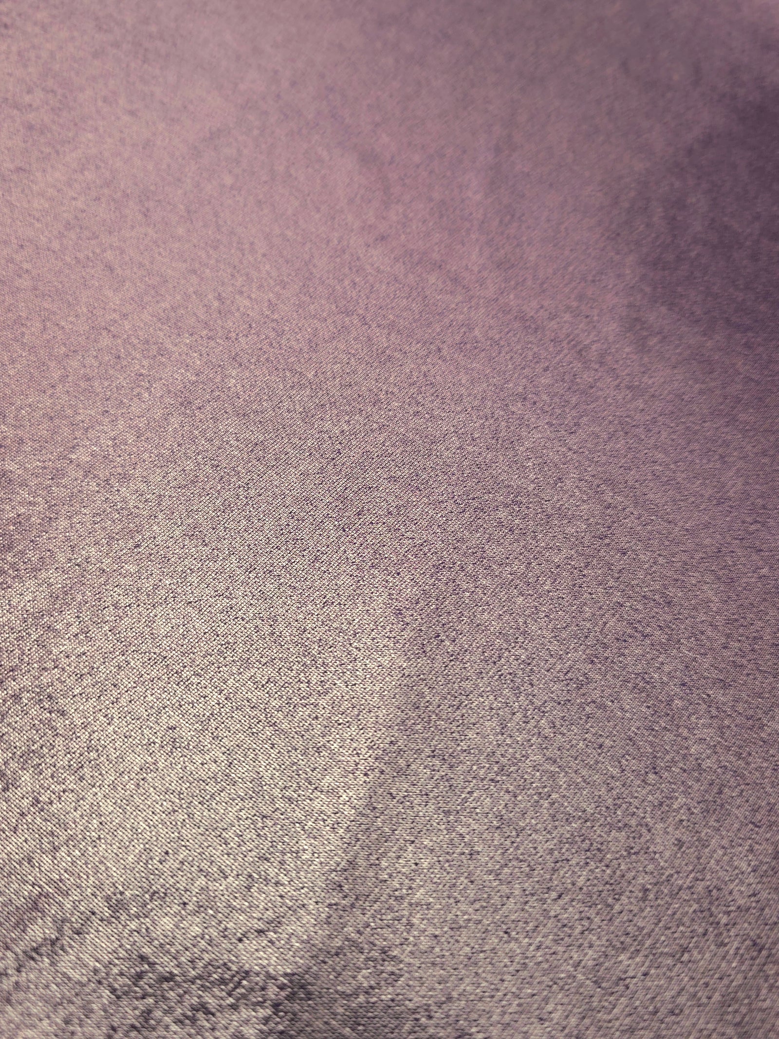 Detailed close-up of Dusty Mauve Gray foiled spandex fabric showing its luminous metallic surface and fine reflective texture
