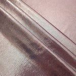 Layered Dusty Mauve Gray shimmer stretch fabric showing metallic foil depth and soft structure for costumes, skirts and fashion apparel