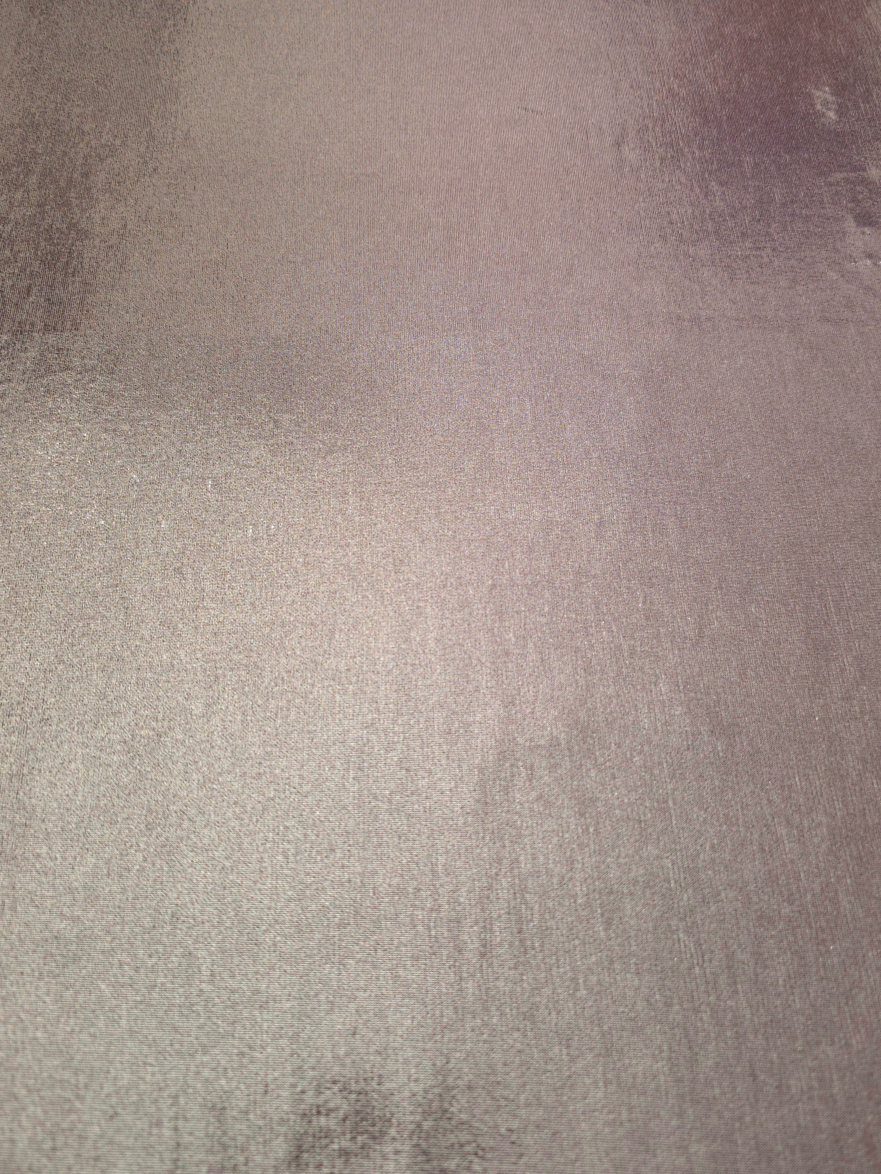 Dusty Mauve Gray metallic foiled spandex shown flat, reflective stretch fabric for dancewear, eveningwear and statement garments