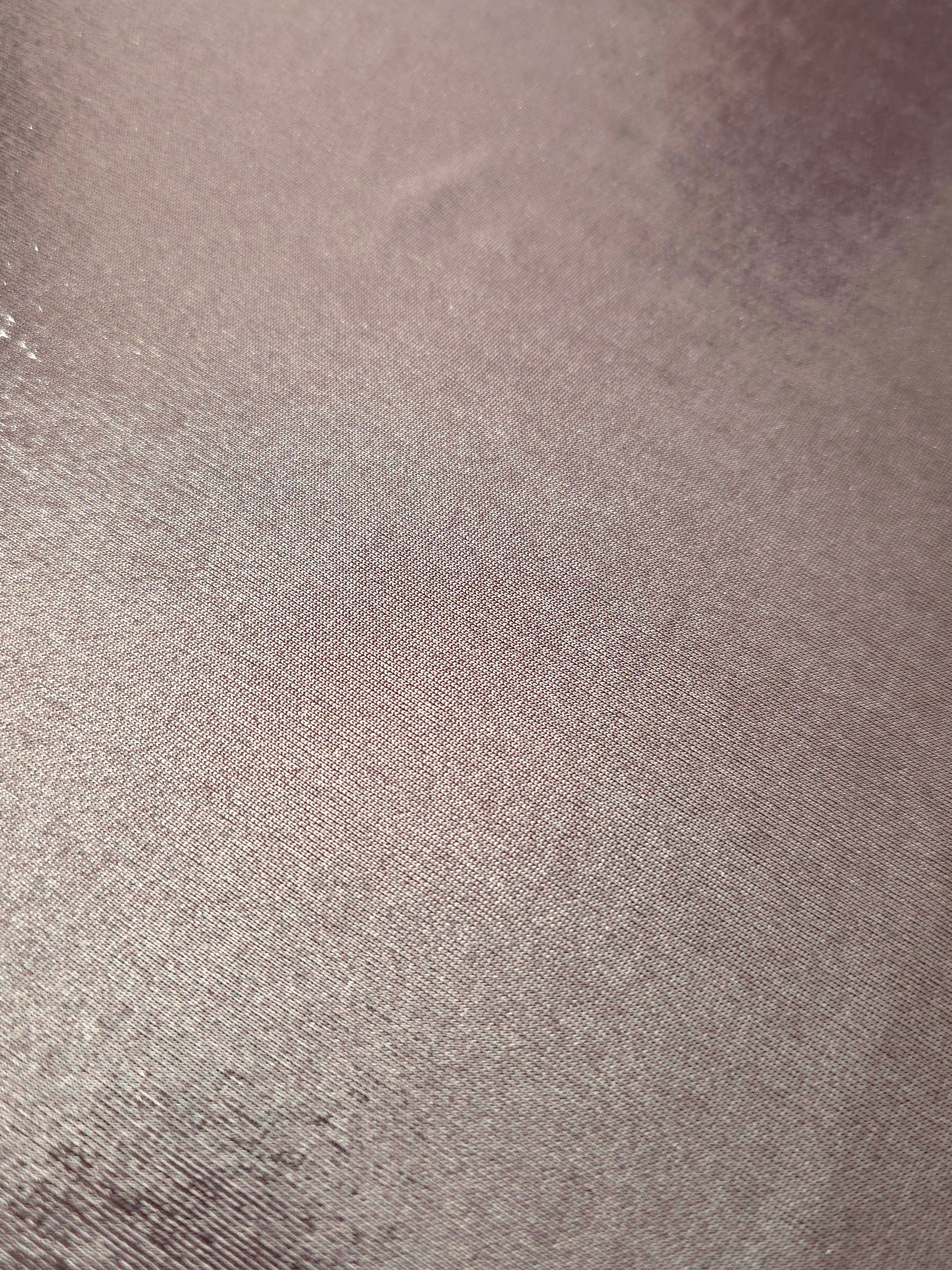 Close-up of Dusty Mauve Gray metallic foiled spandex showing reflective surface texture and the detailed shimmer finish