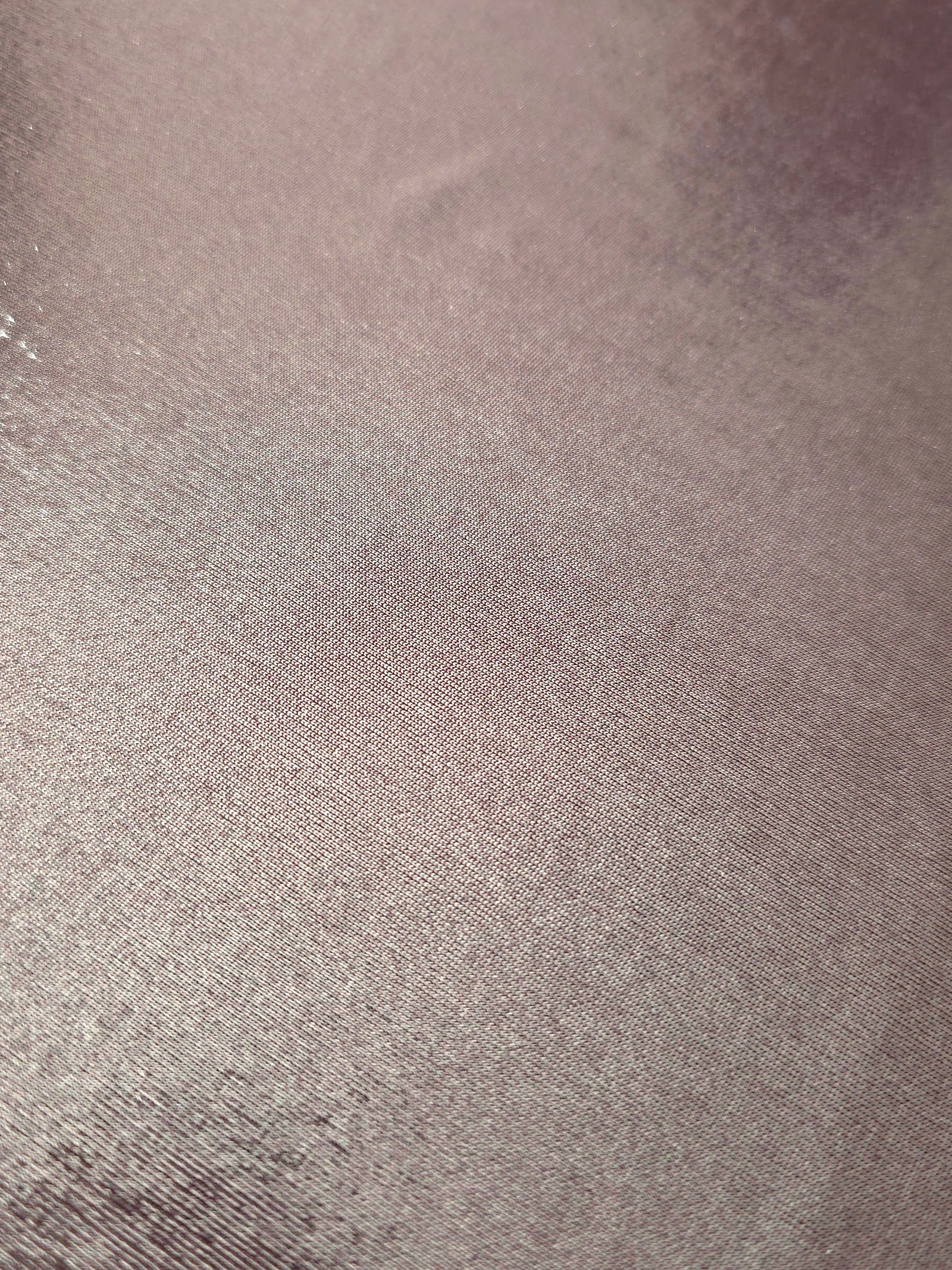 Close-up of Dusty Mauve Gray metallic foiled spandex showing reflective surface texture and the detailed shimmer finish