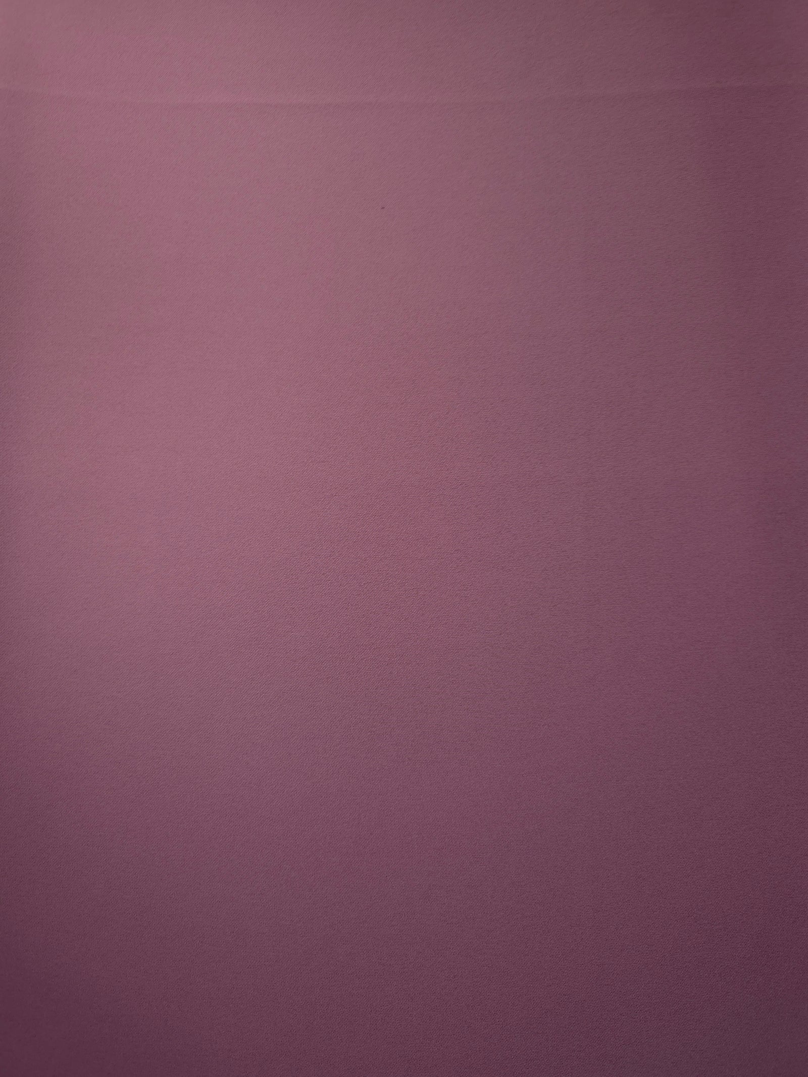 Dusty Mauve opaque Korean polyester crepe shown flat, 205 GSM smooth woven fabric for dressmaking