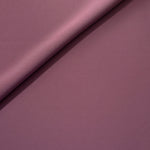 Dusty Mauve opaque Korean polyester crepe in a soft fold, showing flowing drape for garment making