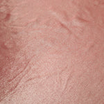 Dusty Peach Pink foiled stretch fabric texture close-up, displaying metallic reflection and fine surface character for apparel design