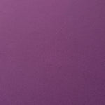 Loose fold of Dusty Plum polyester crepe showing smooth fluid drape for dresses, skirts and soft tailoring