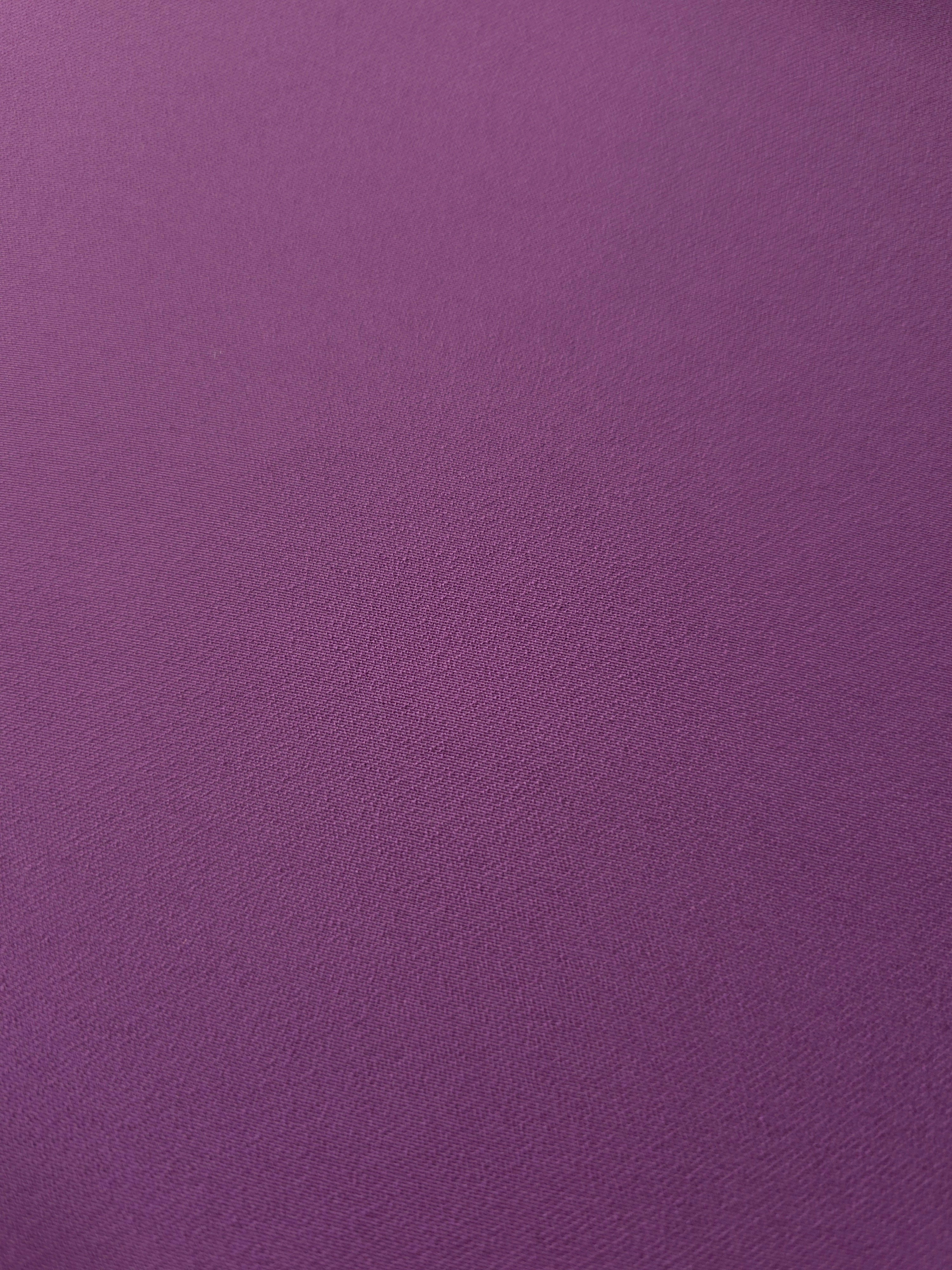Loose fold of Dusty Plum polyester crepe showing smooth fluid drape for dresses, skirts and soft tailoring