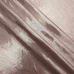 Dusty Rose Taupe shimmer spandex fabric stacked in soft layers, revealing metallic reflection for costumes, dresses and creative apparel
