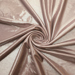 Spiraled Dusty Rose Taupe shimmer spandex fabric showing reflective movement for evening dresses, costumes and performance apparel