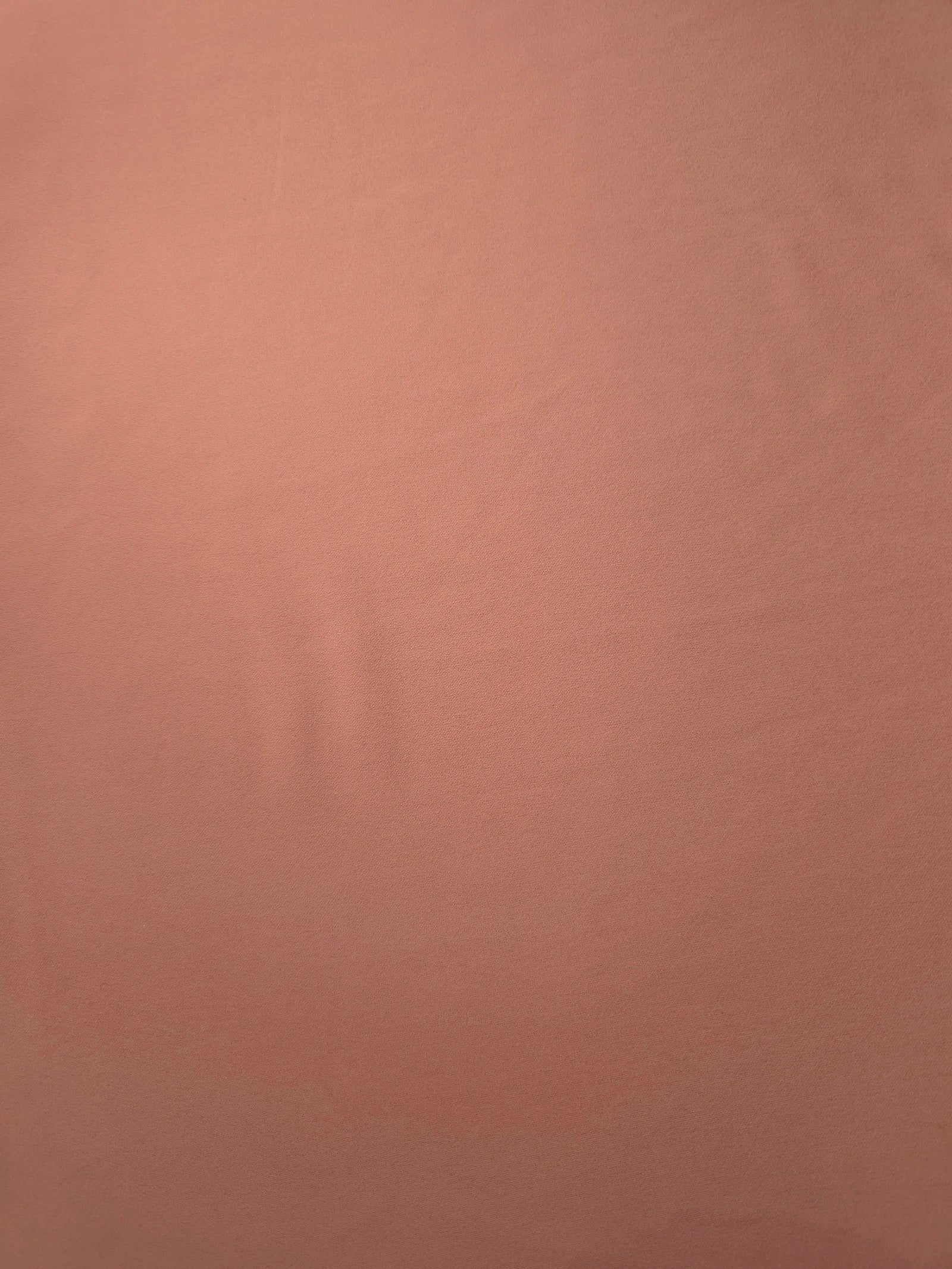 Dusty Rose Taupe opaque Korean polyester crepe shown flat, 205 GSM smooth woven fabric for dressmaking