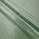 Layered Dusty Sage Green shimmer stretch fabric showing metallic foil depth and soft structure for costumes, skirts and fashion apparel