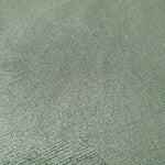 Close-up of Dusty Sage Green metallic foiled spandex showing reflective surface texture and the detailed shimmer finish
